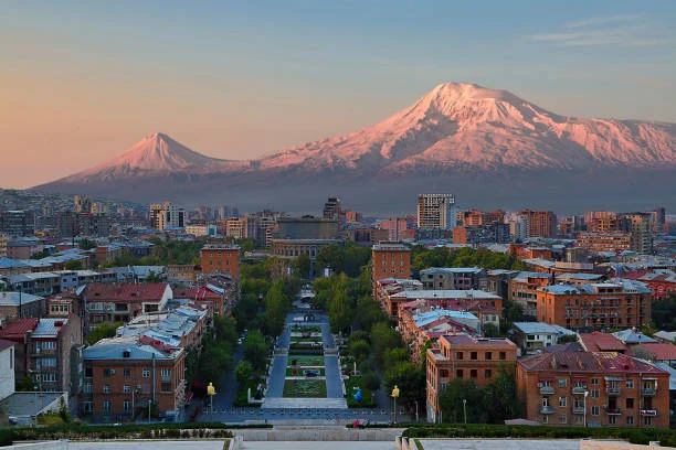 Yerevan cityscape with the snowy twin peaks of Mount Ararat